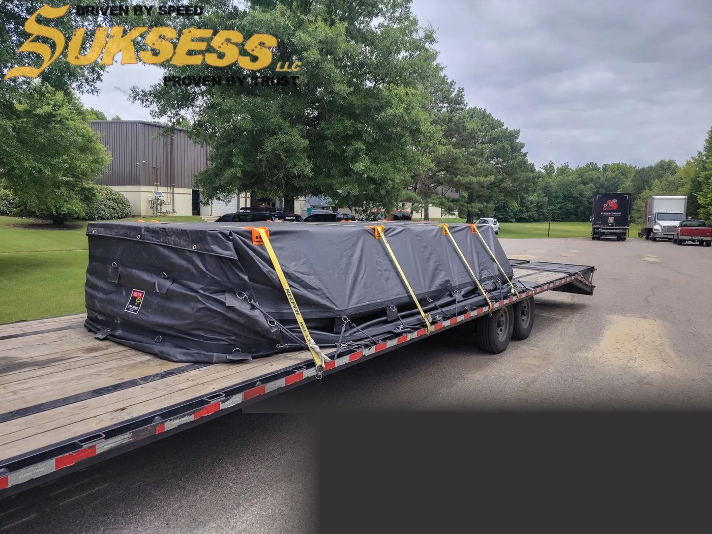 Suksess LLC HotShot gooseneck flatbed with secured load - Arlington, Tennessee