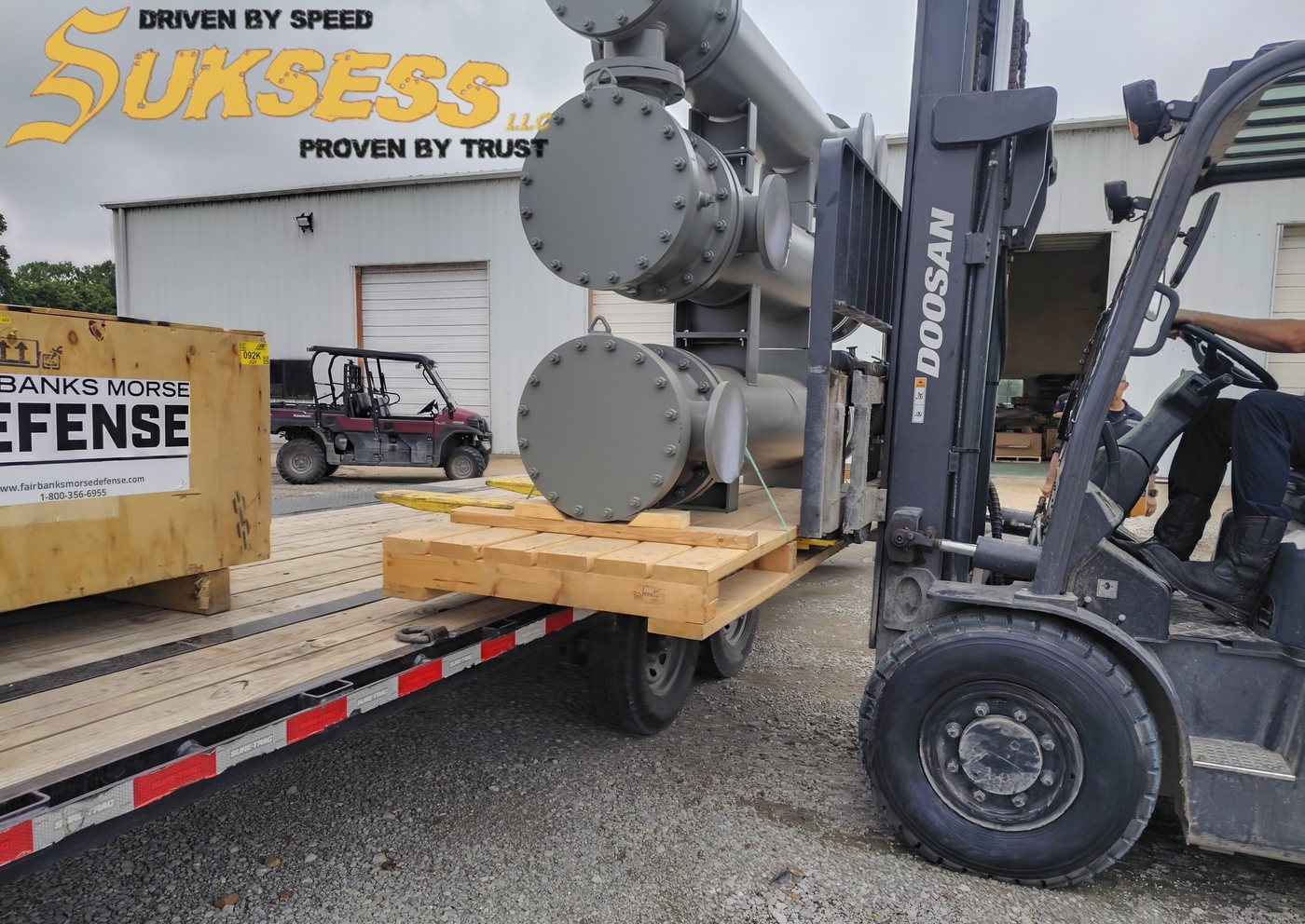 Suksess LLC HotShot - forklift loading pallets onto flatbed - Bay City, Texas